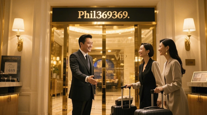 Phil369 로고가 걸린 고급 카지노 로비에서 한국인 커플이 짐을 맡기며 VIP 안내를 받고 있는 장면. 따뜻한 조명 아래 신뢰감 있는 분위기의 실내 장면.